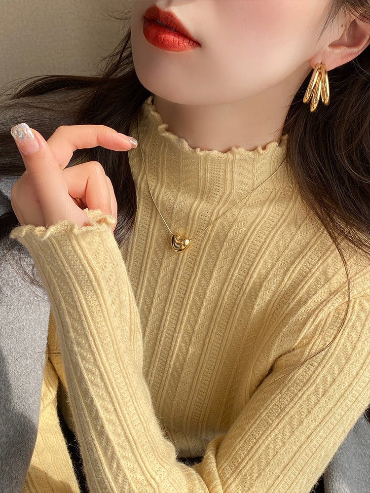The Effortless Elegance | Jersey de punto de manga larga y cuello semi-alto en color liso